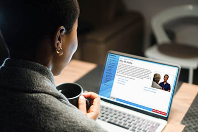 female studing education material that is part of the SIMmersion's knowledge Aquistion